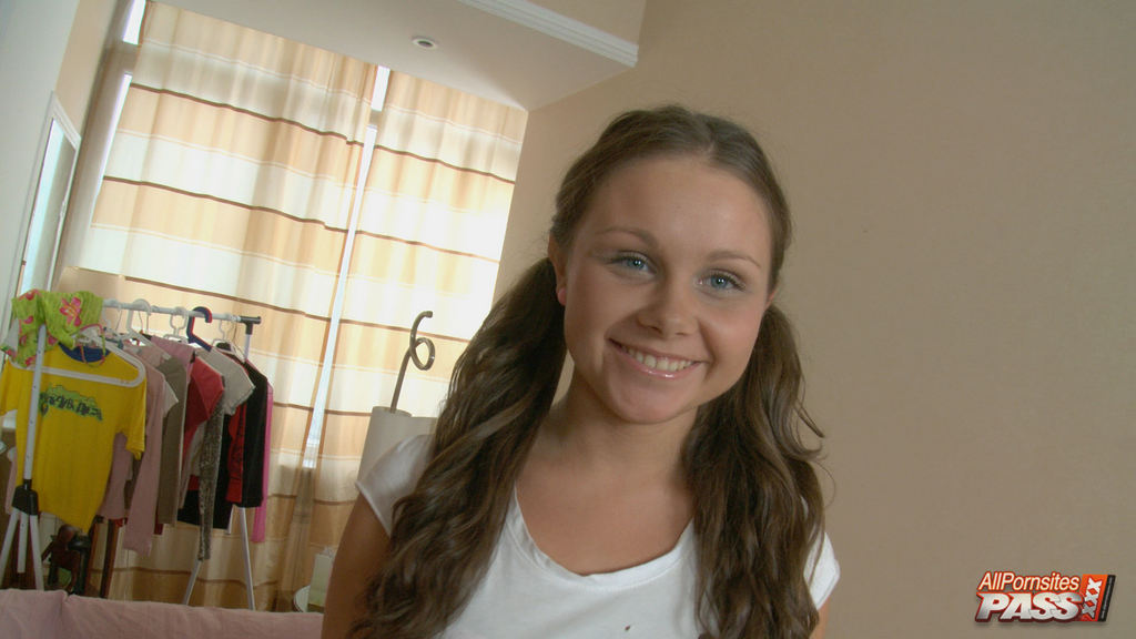 Sweet brunette Irene Ivanova smiling flirtatiously before getting wild on set
